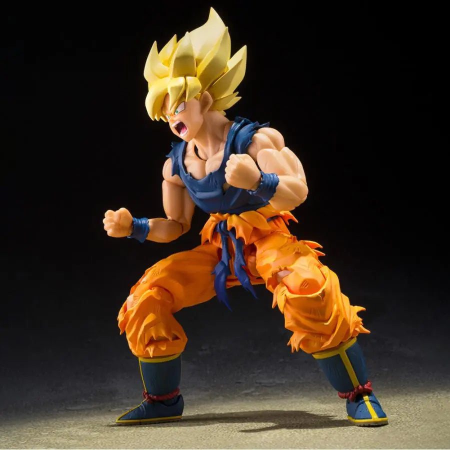 Figurine Super Saiyan Son Goku Fighter rage S.H.Figuarts - vue profil détails musculature tenue orange déchirée