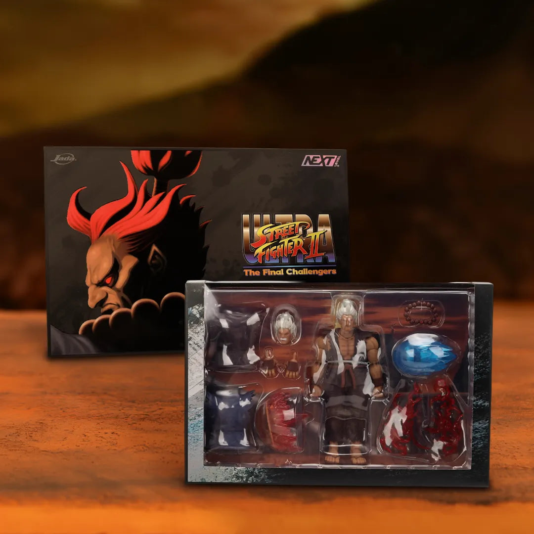 Coffret de la figurine Akuma Ultra Street Fighter II Jada Toys, avec figurine et accessoires présentés dans leur emballage